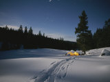 Tents Glow in the Moonlit Snow Photographie par Bobby Model