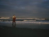 A Fisherman on the Beach Photographic Print by Stephen Alvarez