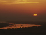 Sunrise over the Nile River in the Valley of the Kings Photographie par Kenneth Garrett