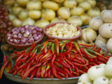 Close View of Chili Peppers and Other Vegetables at a Food Market Photographie par Steve Raymer