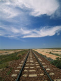 Train Tracks Crossing the Australian Outback Photographic Print by Richard Nowitz