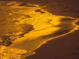 The Surf Along a Beach at Sunset Photographic Print by Todd Gipstein