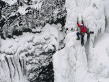 A Climber Scaling an Icy Pitch in Iceland Photographic Print by Bill Hatcher