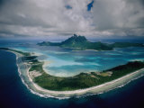Aerial View of Bora-Bora, its White Beaches Ringed by a Coral Reef Photographie par Jodi Cobb