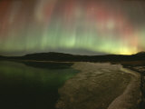 Brilliant Display of Aurorae over the Yukon Territory Photographic Print by Paul Nicklen