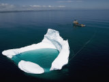 Towing an Iceberg Away from an Oil Platform Photographic Print by Randy Olson