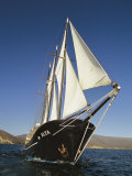 Ship Sailing Through the Galapagos Islands Photographic Print by Steve Winter