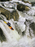 A Kayaker Soars Down the Ice-Covered Great Falls of the Potomac River Photographic Print by Skip Brown