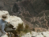 A Park Ranger Views a Twisting Hiking Trail from High Above Photographie par Walter Meayers Edwards