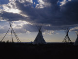 A Cluster of Teepees and Frames in a New Mexico Field Photographic Print by Raul Touzon