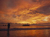 A Brilliant Orange Sunset on the Coast of Costa Rica Photographic Print by Tim Laman