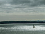 A Solitary Sailboat on the Wisconsin Side of Lake Superior Photographic Print by Medford Taylor