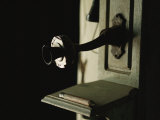 An Antique Telephone Mounted on a Wall Photographic Print by Raul Touzon