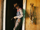 A Cowboy Braids a Lariat Photographic Print by Joel Sartore