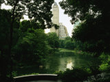A View of a Pond and Lush Foliage in Central Park; the Pond is in the Southeast Corner of the Park Photographic Print by Melissa Farlow