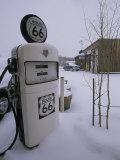 Snow-Covered Gas Pump on Historic Route 66 Photographie par Rich Reid