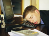 A Man Sleeps with His Head on His Computer Keyboard Photographic Print by Joel Sartore