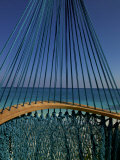 The Turquoise Caribbean Sea Viewed Through Turquoise Hammock Strings Photographic Print by Raul Touzon