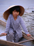 Girl in Canoe by Perfume River, Looking at Camera, Hue, Vietnam Photographie par Pershouse Craig