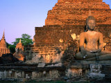 Serene Buddha and Ancient Ruins at Wat Mahathat, Sukhothai Historical Park, Sukhothai, Thailand Photographic Print by Anders Blomqvist