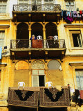 Persian Carpets and Washing Hanging on Apartment Balconies, Tripoli, Lebanon Photographic Print by Bethune Carmichael