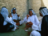 Men Drinking Tea Outside the Holy Shrine of the Imam Ali Ibn Abi Talib, an Najaf, Iraq Photographie par Jane Sweeney