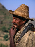 Forest worker with locally crafted axe in the Simien Mountains, Gondar, Gondar, Ethiopia, Giclee Print
