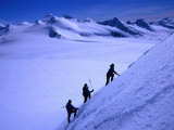 Mountaineers Ascending the Peaks Above Shackleton Gap, Antarctica Photographie par Grant Dixon