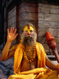 Sadhu Sitting on a Stone Chaitya on the Eastern Banks of the Bagmati River, Pashupatinath, Nepal Photographic Print by Ryan Fox