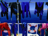 Wetsuits Drying on "Live-Aboard" Dive Boat in Straits of Gubal, Egypt Photographic Print by Jean-Bernard Carillet