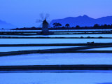 Windmill and Surrounding Saltpans on the Island of San Pantaleo, Sicily, Italy Photographic Print by Dallas Stribley
