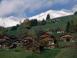 Wooden Chalets on Slope with Snow-Capped Peaks in the Background, Rougemont, Switzerland Photographic Print by Martin Moos