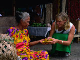 Female Tourist Buying Bananas from Local Woman at Market, Apia, Samoa Photographic Print by Philip & Karen Smith