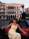 Woman in Gondola in Front of Ca'D'Oro in Grand Canal, Venice, Veneto, Italy Photographic Print by Roberto Gerometta