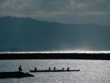 Fishermen Paddle an Outrigger in Wailua Bay on the North Shore of Oahu, Haleiwa, Hawaii, USA Photographic Print by Lawrence Worcester