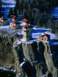Lighthouse and Houses Under Blanket of Snow on Top of Cliff at Split Rock, Minnesota, USA Photographic Print by Jim Wark
