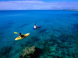 Man and Woman Kayaking on Fernandez Bay, Cat Island, Bahamas Photographic Print by Greg Johnston
