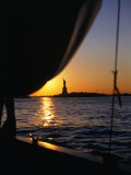 Statue of Liberty at Sunset from Staten Island Ferry, New York City, New York, USA Photographic Print by Angus Oborn