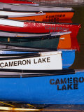 Canoes at Cameron Lake, Waterton Lakes National Park, Alberta, Canada Photographic Print by Lawrence Worcester