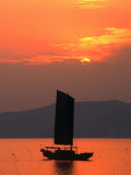Fishing Boat Sailing Across Lake Taihu at Sunset, Wuxi, China Photographic Print by Keren Su