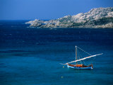 Traditional Sailboat on Rocky Coast of Island, Sassari, Maddalena, Sardinia, Italy Photographic Print by Dallas Stribley