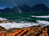 Rainbow Dipping into Coles Bay During Stormy Weather, Freycinet National Park, Tasmania, Australia Photographie par Grant Dixon