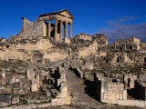 Capitol of Dougga Behind Stone Paved Street and Ruined Houses, Dougga, Tunisia Photographic Print by Pershouse Craig