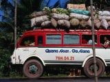 Bus Carrying Load and Passengers, Vietnam Fotografie-Druck von John Borthwick