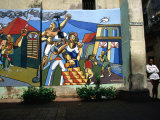 Woman Leaning Against a Wall with Mural in Old Havana, Havana, Cuba Photographic Print by Rick Gerharter
