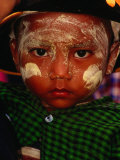 Boy with Paste of Thanakha Tree Bark on Face, Looking at Camera, Myanmar (Burma) Photographic Print by Frank Carter
