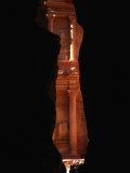 Glimpse of Al-Khazneh, Seen Through the Narrow As-Siq Gorge, Petra, Jordan Photographic Print by Patrick Syder