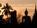 Buddha Statue and Sunset, Thailand Photographic Print by Gavriel Jecan