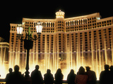 Spectators Watch the Water Fountain Show at the Bellagio Hotel and Casino in Las Vegas, Nevada, USA Photographic Print by Brent Bergherm