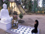 Woman Praying to Buddha, Vinh Trang Pagoda, My Tho City, Vietnam Photographic Print by Bill Bachmann